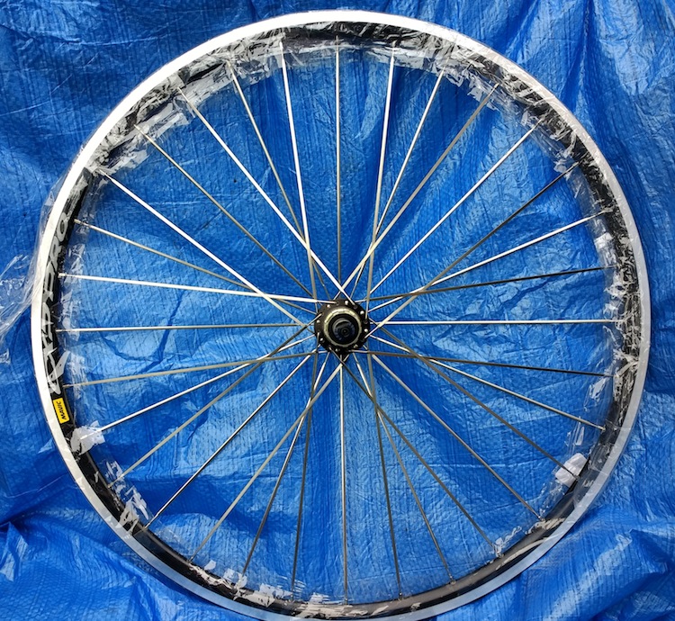 Rear wheel, radial-tangent lacing, bladed spokes
